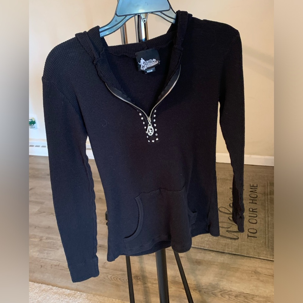 Beautiful Graceland ribbed studded black hooded sweater with front pocket.